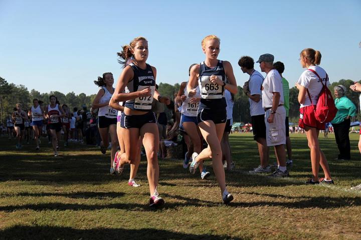 High school girls competing in a cross country race. 